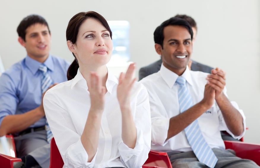 Talent Acqusition - International business people clapping at a conference. Business concept..jpeg